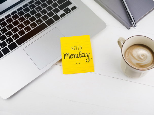 Hello Monday text with smiley face on sticky note on desk - Photo, Image