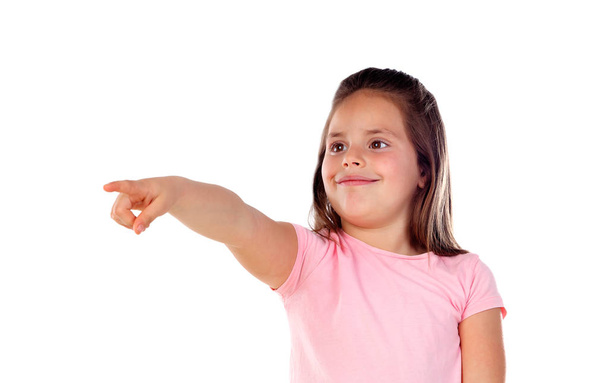 söpö tyttö osoittaa sormella eristetty valkoinen tausta
 - Valokuva, kuva