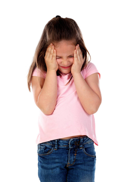 happy little girl in pink t-shirt  having headache isolated on white background - Фото, зображення
