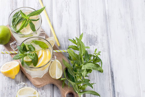 Lemonade in glass with ice and mint  - Foto, Imagen