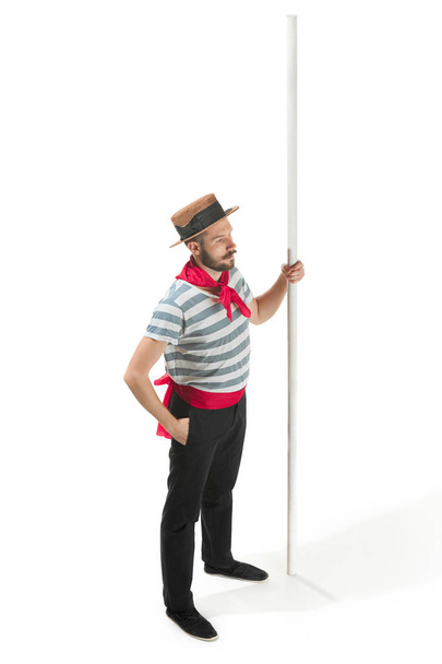 Caucasian man in traditional gondolier costume and hat - Фото, изображение