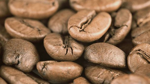 Roasted coffee beans macro shot - Photo, Image