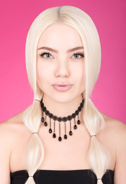 Beauty portrait of young beautiful woman on pink background. Long white hair - Fotoğraf, Görsel