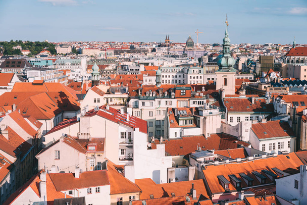 Top view to red roofs skyline of Prague city Czech republic - Fotó, kép