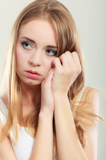 Young sad stressed woman closeup - Fotó, kép