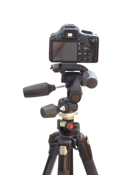 Fotocamera DSLR moderna professionale su treppiede moderno
 - Foto, immagini