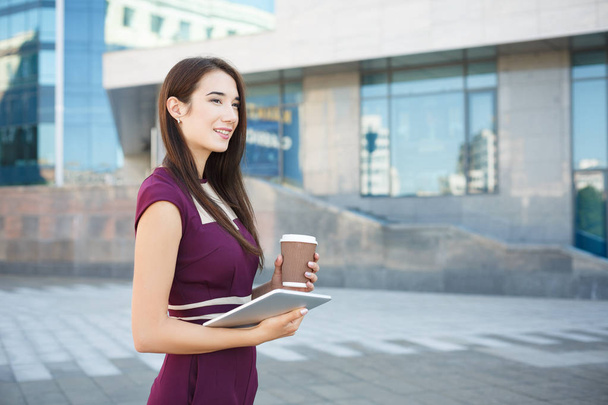 Portrait of a confident young businesswoman with tablet - Photo, Image