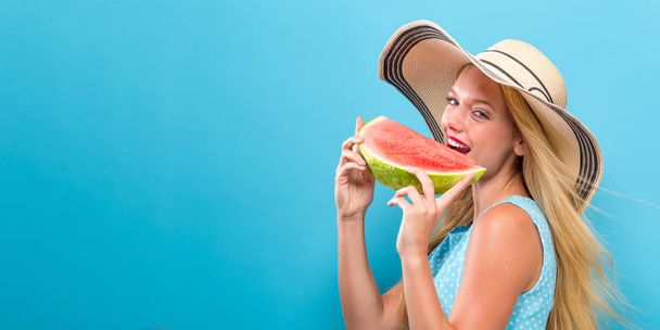 Happy young woman holding watermelon  - Zdjęcie, obraz