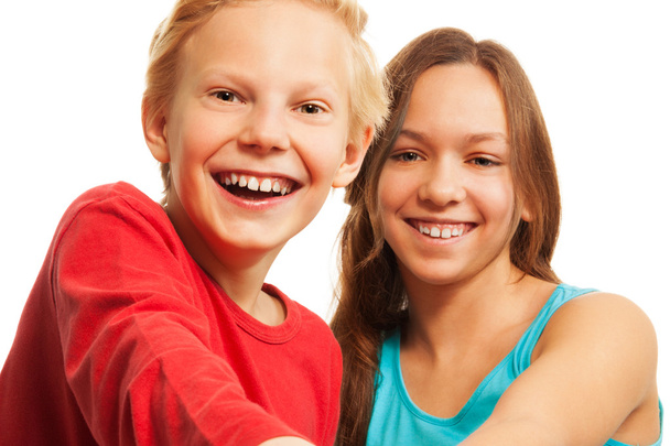 Laughing teen boy and girl - Fotó, kép