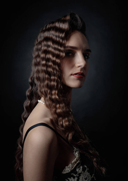 Portrait of a beautiful woman with perfect long hair . - Photo, image