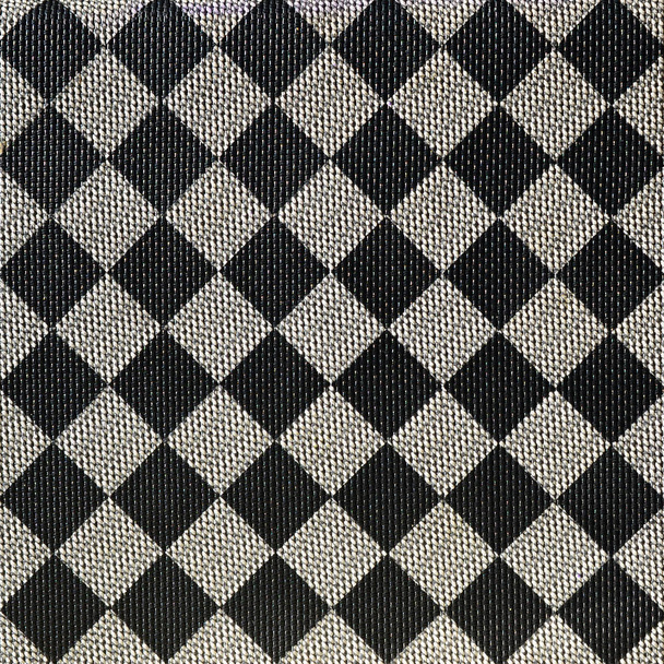 Plastic texture in the form of a very small cloth binding, painted in black and gray in the style of a chessboard. Macro shot - Photo, Image