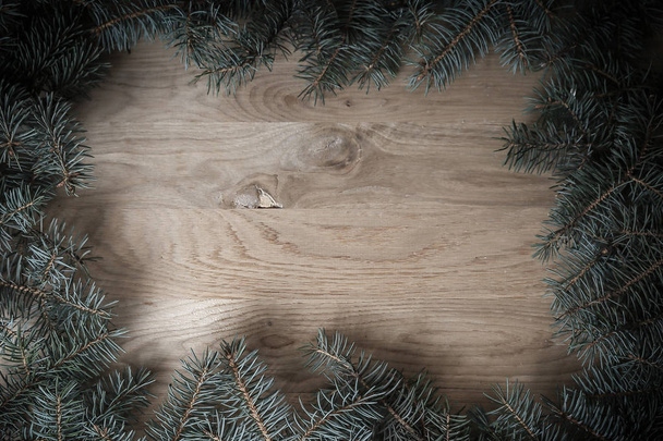 traditional green Christmas wreath on wooden background - Fotografie, Obrázek