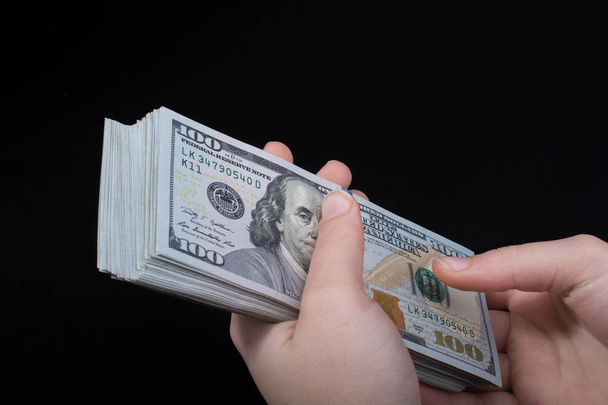 Τραπεζογραμμάτια αμερικανικού δολαρίου που έχουν απομονωθεί σε λευκό φόντο - Φωτογραφία, εικόνα