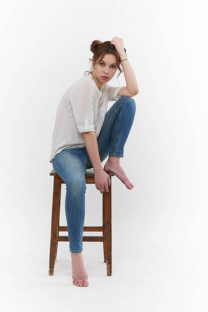 girl in blue denim jeans - Foto, afbeelding