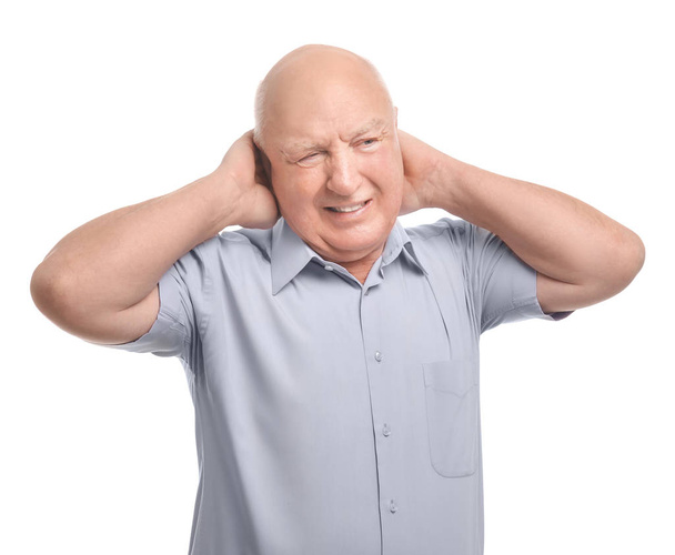 Senior man suffering from pain in neck on white background - Foto, imagen