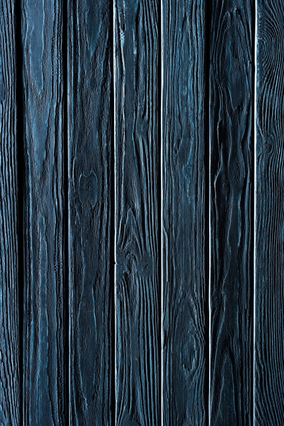 Wooden vertical planks painted in blue background - Photo, Image