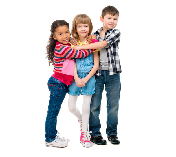 three smiling little children standing together - Photo, Image