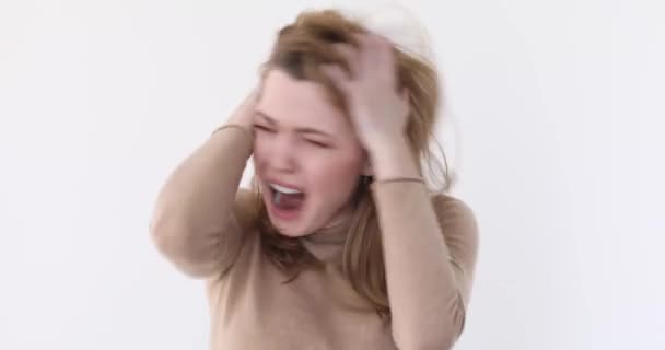 Close up of a young stressed girl shouting - Footage, Video