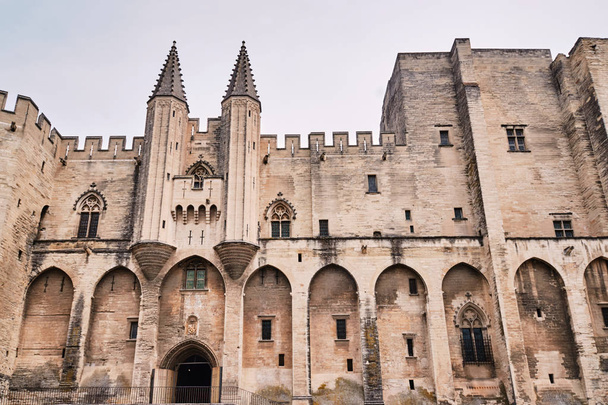 walls of the medieval Castle of the Popes in the city of Avignon in France - 写真・画像