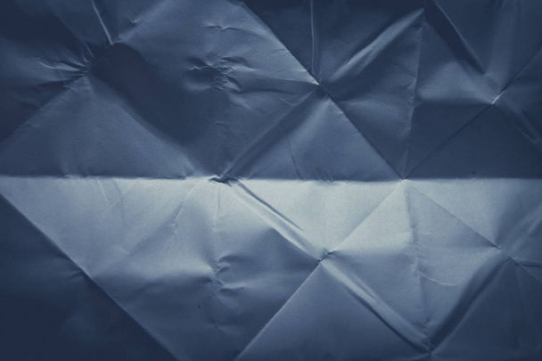 Blue folded paper textured background  - Fotó, kép