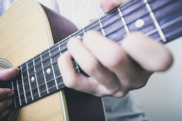 Playing Acoustic guitar closeup shot - 写真・画像