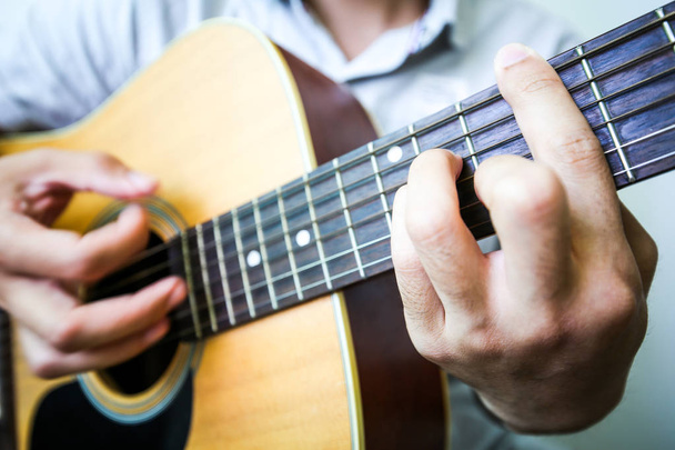 Playing Acoustic guitar closeup shot - Foto, afbeelding