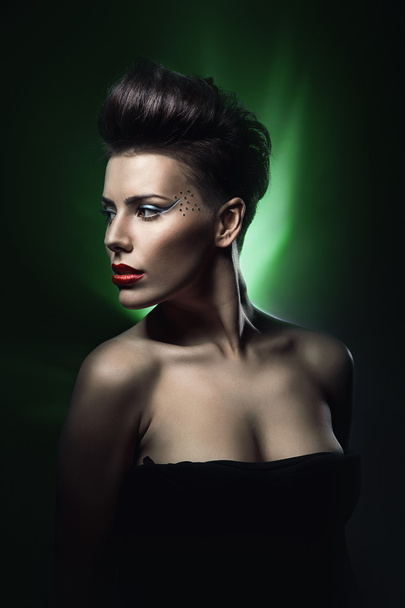 sexy woman with red lips in green light - Photo, Image