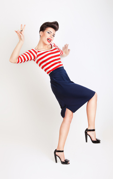 cute happy woman in t-shirt and skirt - Foto, afbeelding