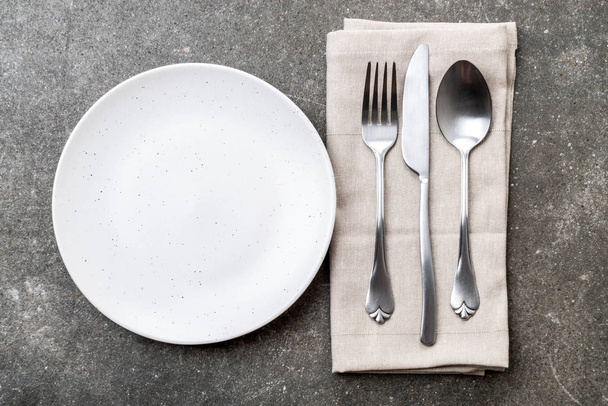 empty plate spoon fork and knife - Fotoğraf, Görsel