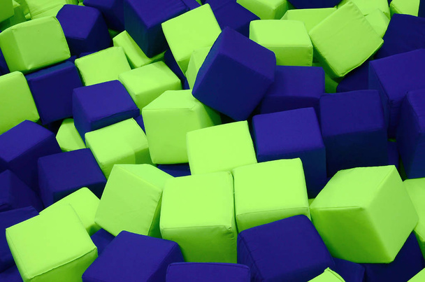 Many colorful soft blocks in a kids' ballpit at a playground - Photo, Image