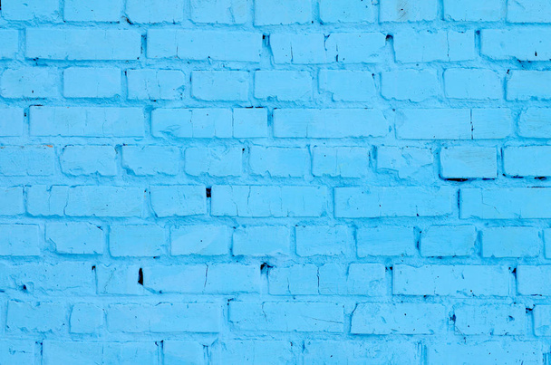 Square brick block wall background and texture. Painted in blue - Zdjęcie, obraz