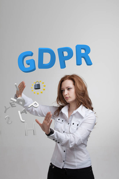 GDPR, concept image. General Data Protection Regulation, the protection of personal data. Young woman working with information. - Foto, Imagen