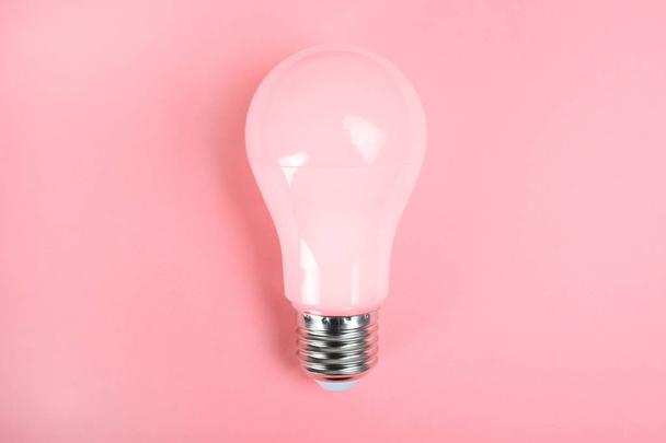 One pink incandescent bulb - Fotó, kép