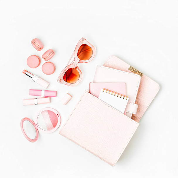 Sunglasses, lipsticks, blush, macaroons, notebooks and handbag isolated on white background - Foto, Imagem