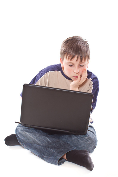 Teenage boy with a laptop - Valokuva, kuva
