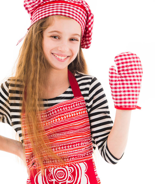 Girl in red apron and baking glove - Photo, image