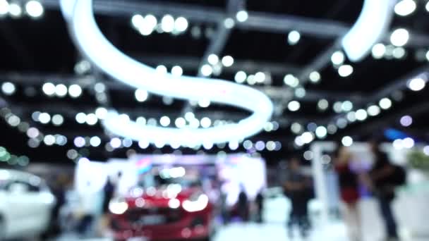 Blur of car in motor show exhibition - Footage, Video