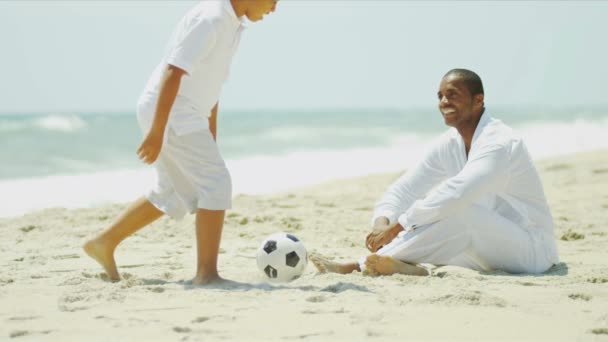 African American father son playing soccer - Footage, Video