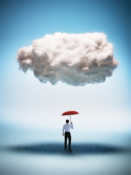 Бизнесмен с красным зонтиком стоит под большим облаком
. - Фото, изображение