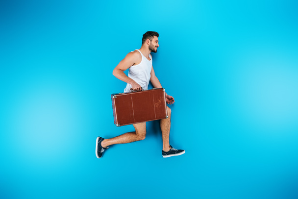 Man with suitcase - Foto, Bild