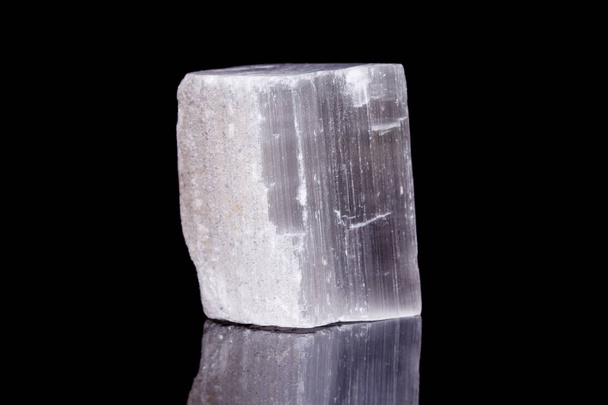 Macro mineral stone Selenite on black background - Photo, Image