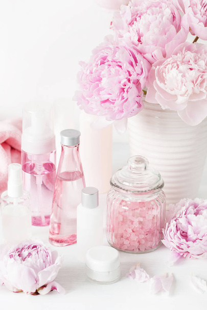 bath and spa with peony flowers beauty products towels - Фото, зображення