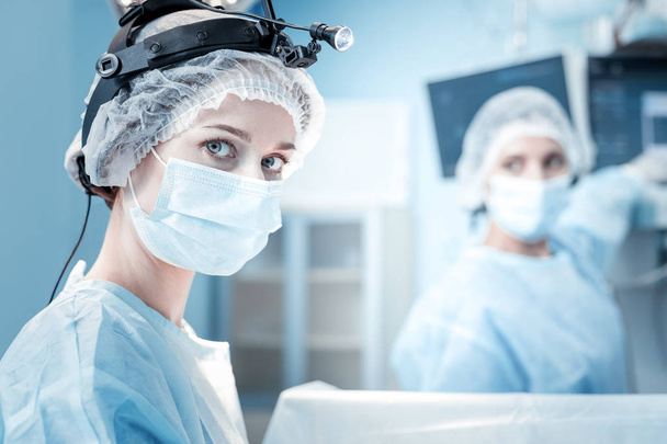 Portrait of a smart female surgeon - Фото, зображення