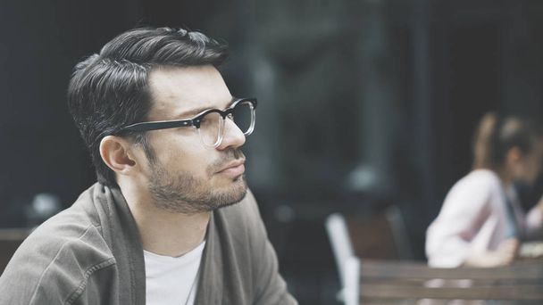 A profile of handsome man in eyeglasses outdoors - Foto, immagini