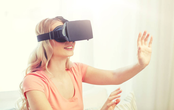 woman in virtual reality headset or 3d glasses - Foto, afbeelding