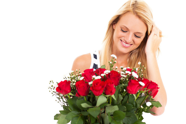 Happy young woman received bunch of roses from secret admirer - 写真・画像