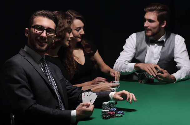businessman showing four aces - Photo, Image