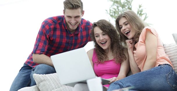 students people browsing through your favorite video on the laptop - Φωτογραφία, εικόνα