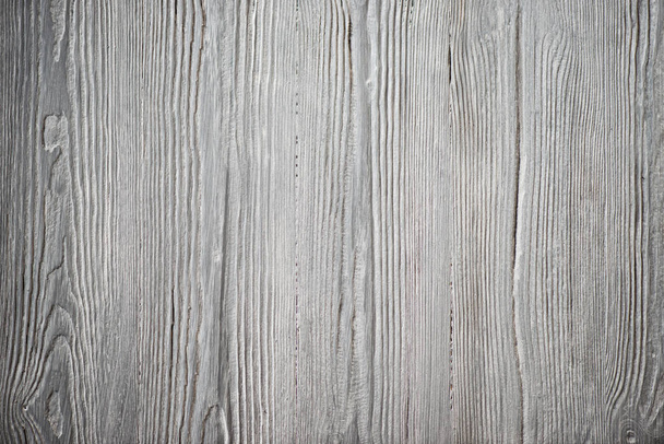 Wood texture. Gray timber board with weathered crack lines. Natural background for shabby chic design. Grey wooden floor image. Aged tree surface close-up backdrop template - Фото, изображение