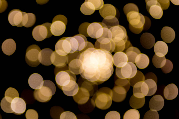 Abstract blurred lights with black background - Φωτογραφία, εικόνα